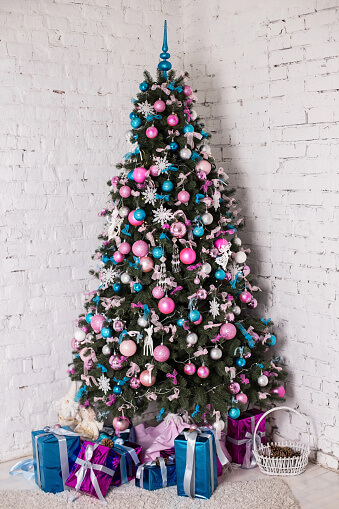 Decorated Christmas tree on white background